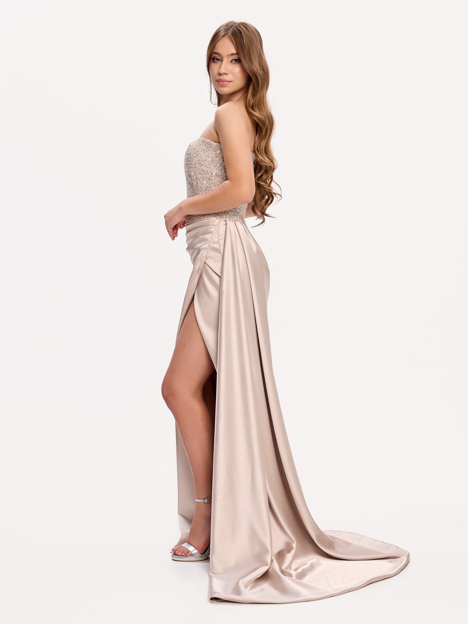 Embellished evening gown with draped skirt