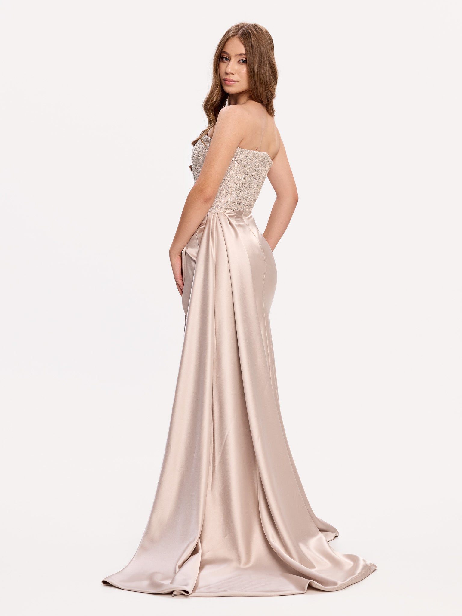 Embellished evening gown with draped skirt